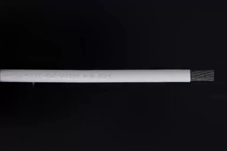 RAYCHEM-CEC-RWC-23399 A-B 2014 white colored wrapper for black wire.